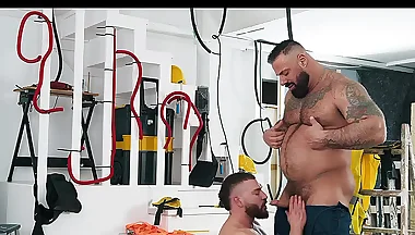 Coworkers engage in intimate moments during working hours.