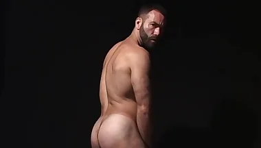 Hairy daddy Ray Dragon plays with his big throbbing cock solo